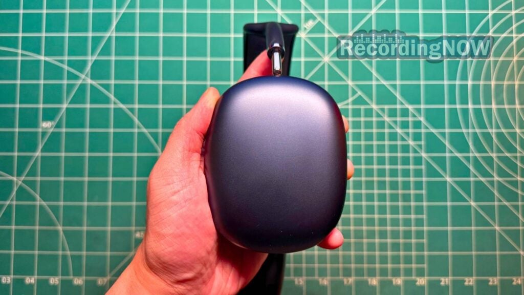 Holding Apple AirPods Max 1st Gen USB-C 2024 refresh in hand