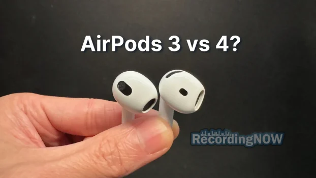 Holding Apple AirPods 3 vs AirPods 4 wireless earbuds in hand