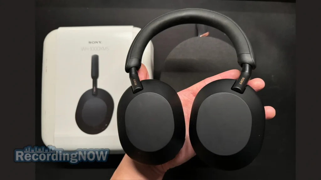 blog-img-1709408991791 Holding Sony WH 1000XM5 headphones in hand