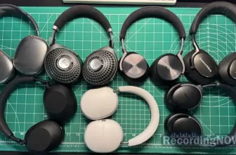 Apple Airpods Max, Focal Bathys, Bang & Olufsen H95, Bowers & Wilkins px8, Sony WH-1000XM6, Sonos Ace, and Bose QuietComfort Ultra headphones on desk