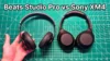Holding Beats Studio Pro vs Sony WH-1000XM4 side by side in hand
