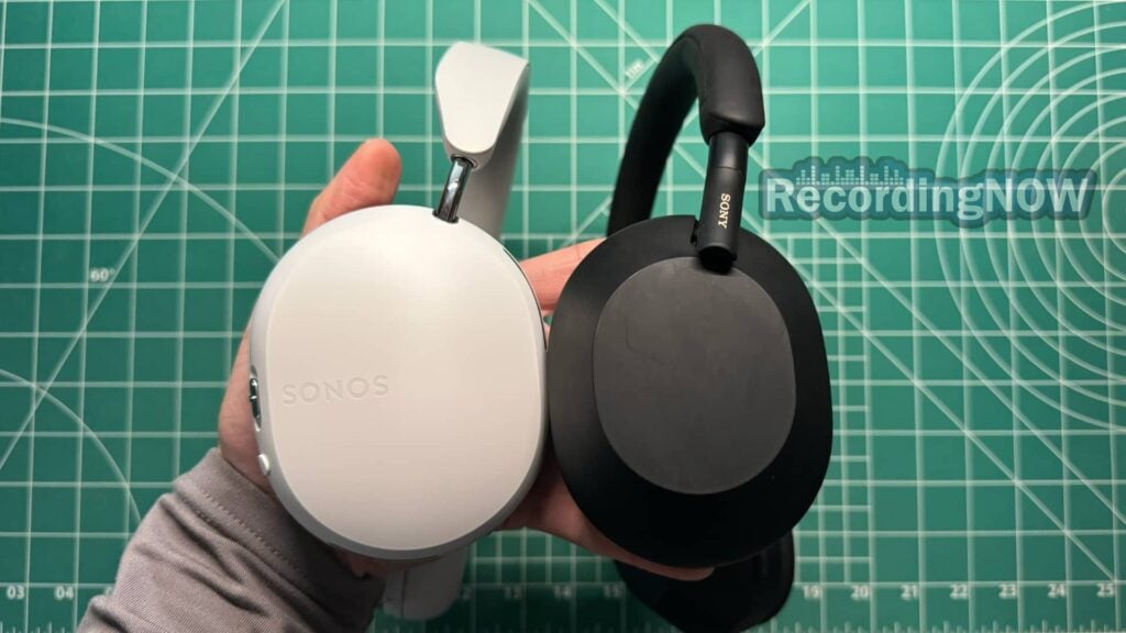 Holding Sonos Ace vs Sony XM5 headphones side by side in hand
