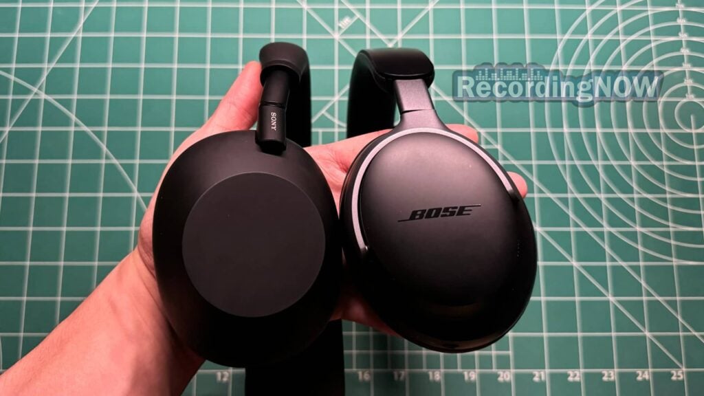 Holding Sony XM6 vs Bose QC Ultra headphones side by side in hand