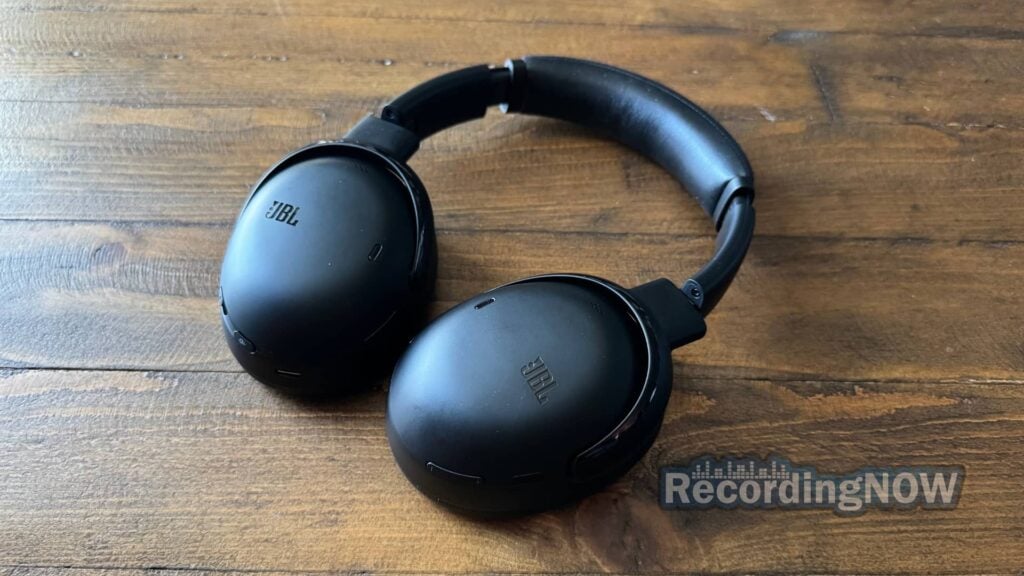 blog-img-1693067280109 JBL Tour One M3 headphones on wood desk