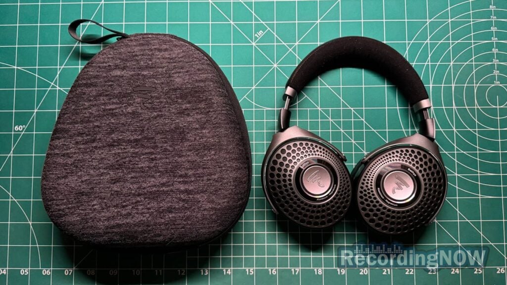 Focal Bathys headphones next to included hardshell case