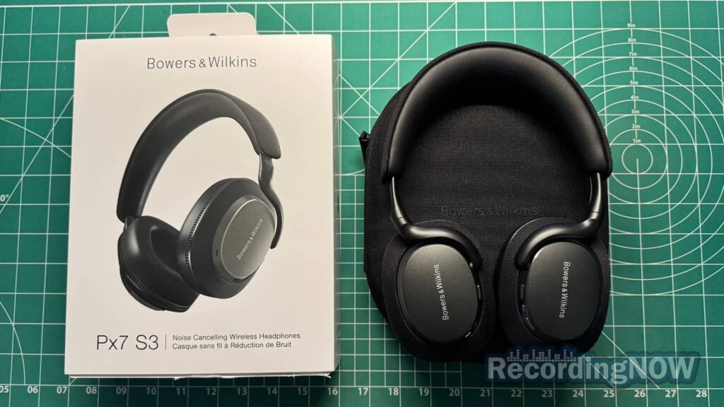 Bowers and Wilkins Px7 S3 on hardshell case and next to original packaging box