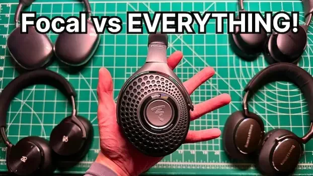 Holding Focal Bathys headphones with Apple AirPods Max, Bang & Olufsen H95, Bowers & Wilkins Px8, and Bose QuietComfort Ultra in background
