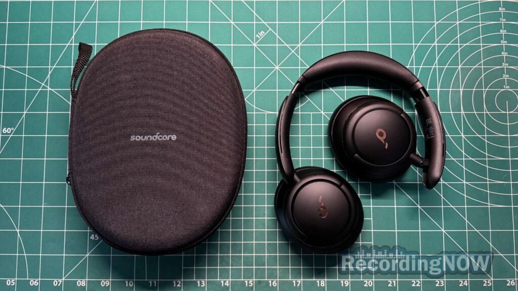 Anker Soundcore Life Q30 headphones in black next to included hardshell case