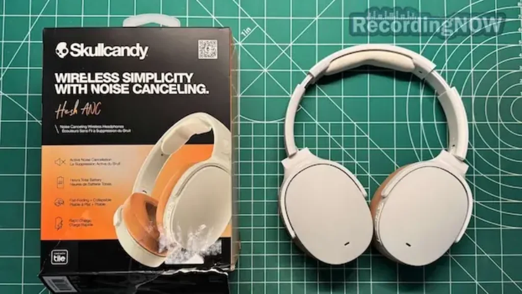 Skullcandy Hesh ANC headphones in white next to original box packaging