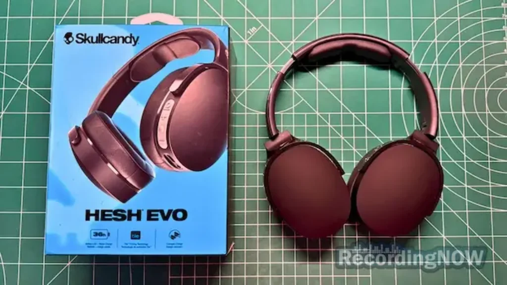 Skullcandy Hesh Evo headphones in black next to original box packaging