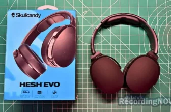 Skullcandy Hesh Evo headphones in black next to original box packaging
