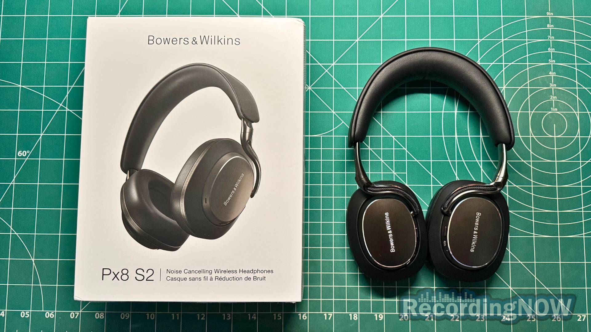 Bowers and Wilkins Px8 S2 headphones next to original box and packaging