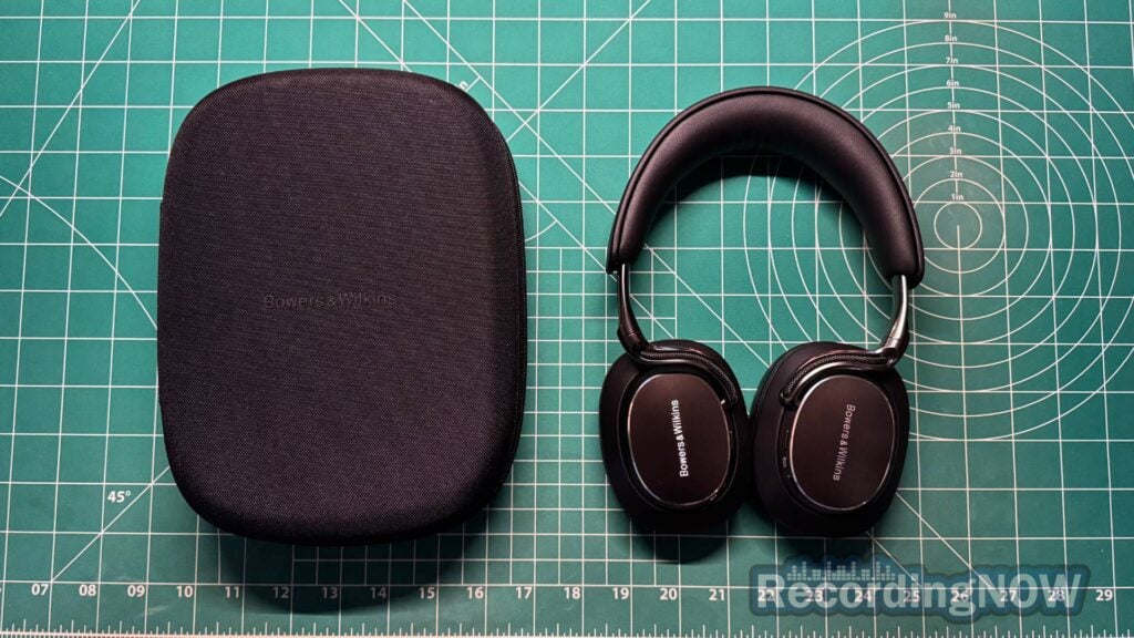 Bowers & Wilkins Px8 S2 headphones next to included premium Hard Shell case
