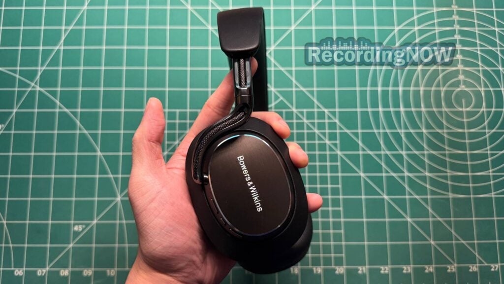 Holding Bowers & Wilkins Px8 S2 in Onyx Black in hand