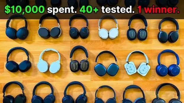 many wireless noise cancelling over-ear headphones spread out along floor
