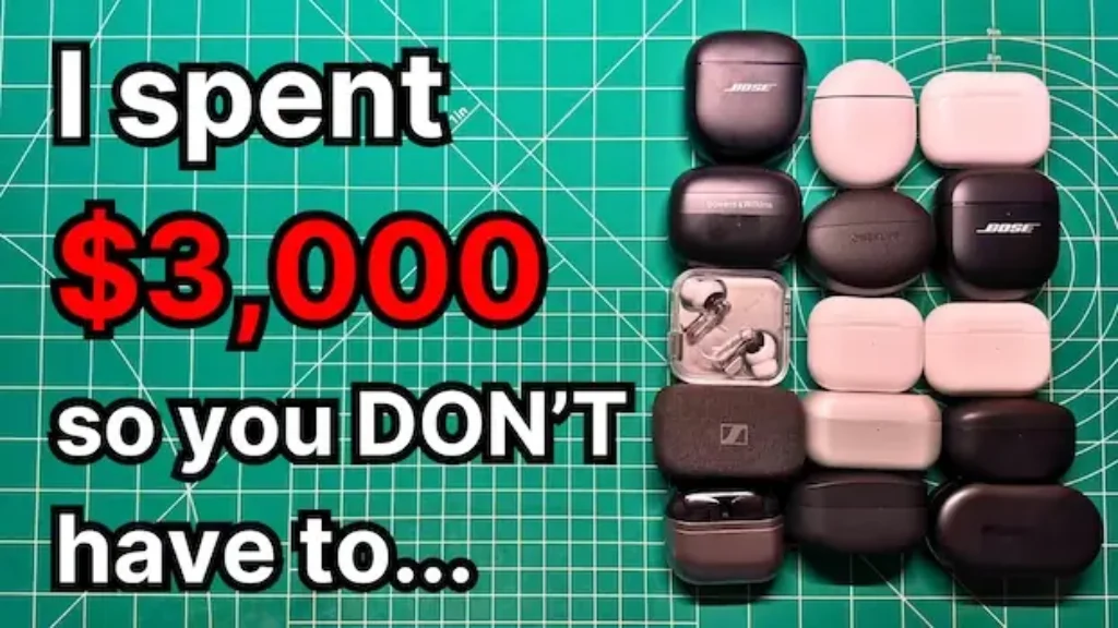 many wireless noise cancelling earbuds spread out across desk