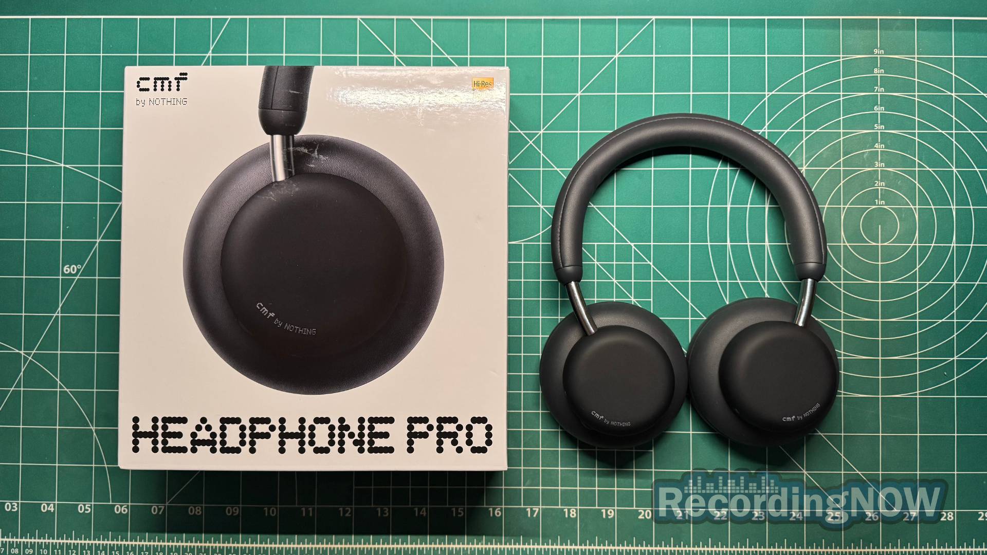 CMF Headphone Pro by Nothing next to original box packaging
