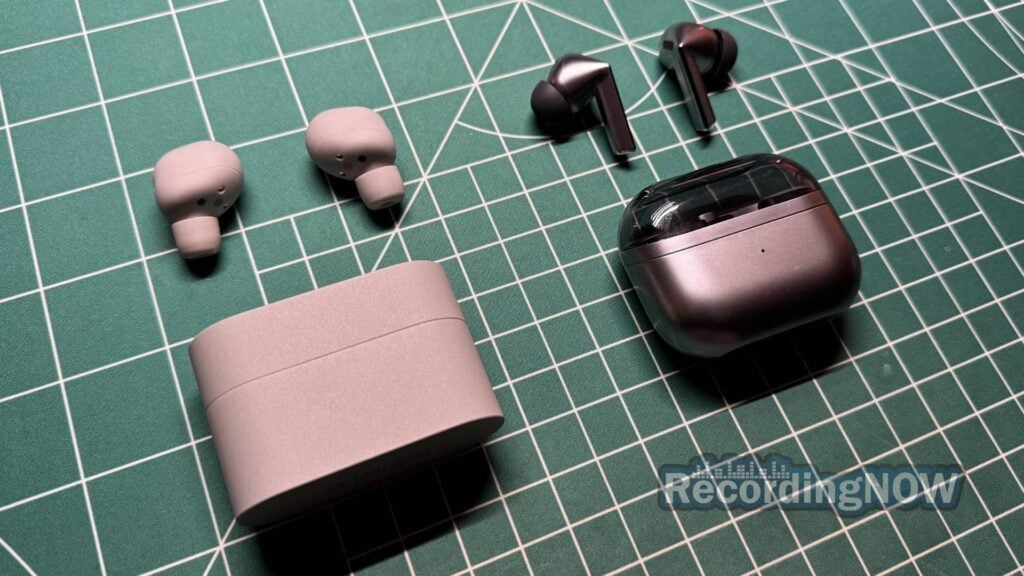 Sony XM6 earbuds and charging case next to Samsung Galaxy Buds3 Pro earbuds and charging case