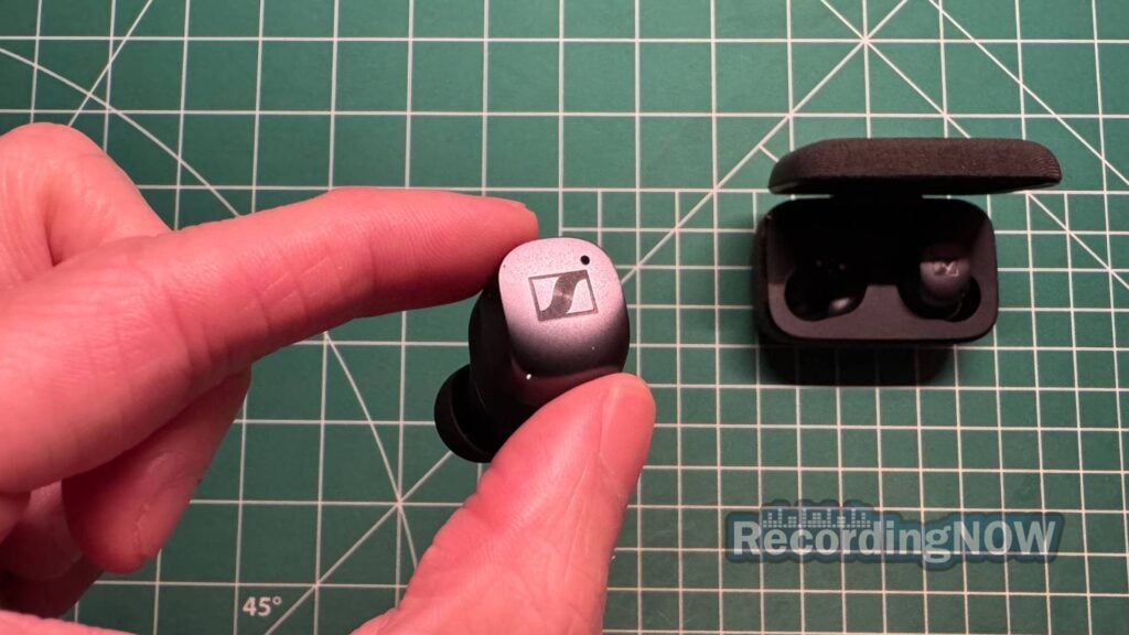 Holding Sennheiser Momentum True Wireless earbud