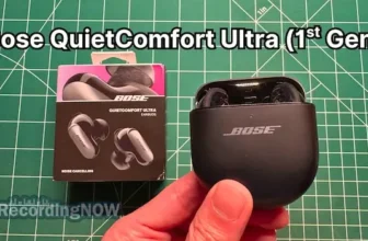 Holding Bose QuietComfort Ultra Earbuds 1st Generation in hand