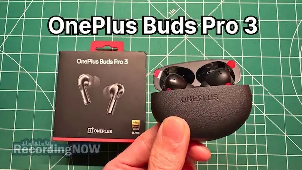 holding OnePlus Buds Pro 3 wireless noise cancelling earbuds in hand