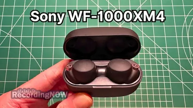holding Sony WF-1000XM4 wireless noise cancelling earbuds in hand