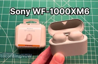 Holding Sony WF-1000XM6 wireless noise cancelling earbuds in hand