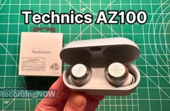 Holding Technics EAH-AZ100 wireless noise cancelling earbuds in hand