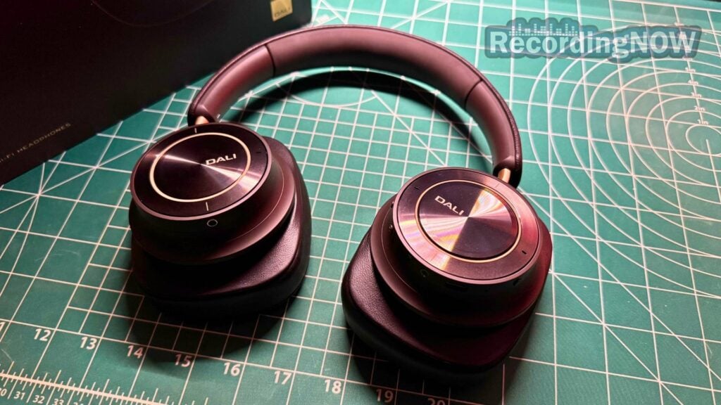 Dali IO-12 on desk next to original box packaging