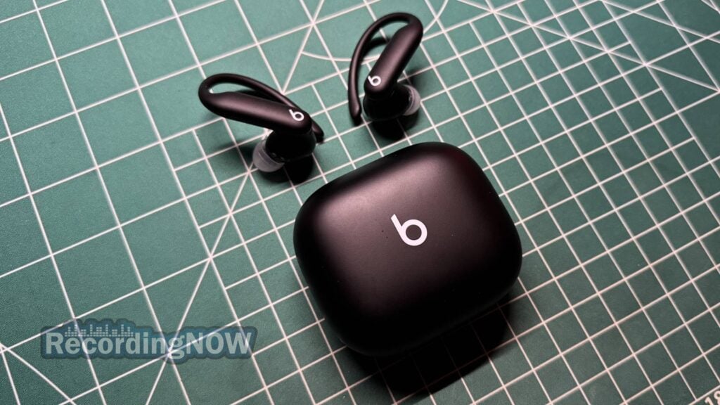 Beats Powerbeats Pro 2 next to charging case