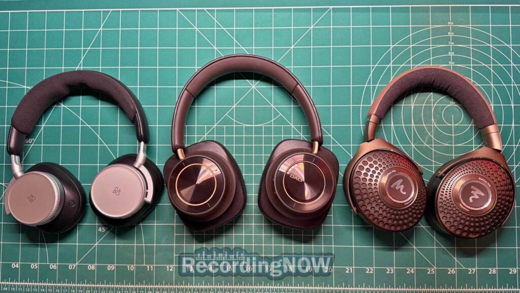 Bang & Olufsen Beoplay H100, Dali IO-12, and Focal Bathys MG on desk