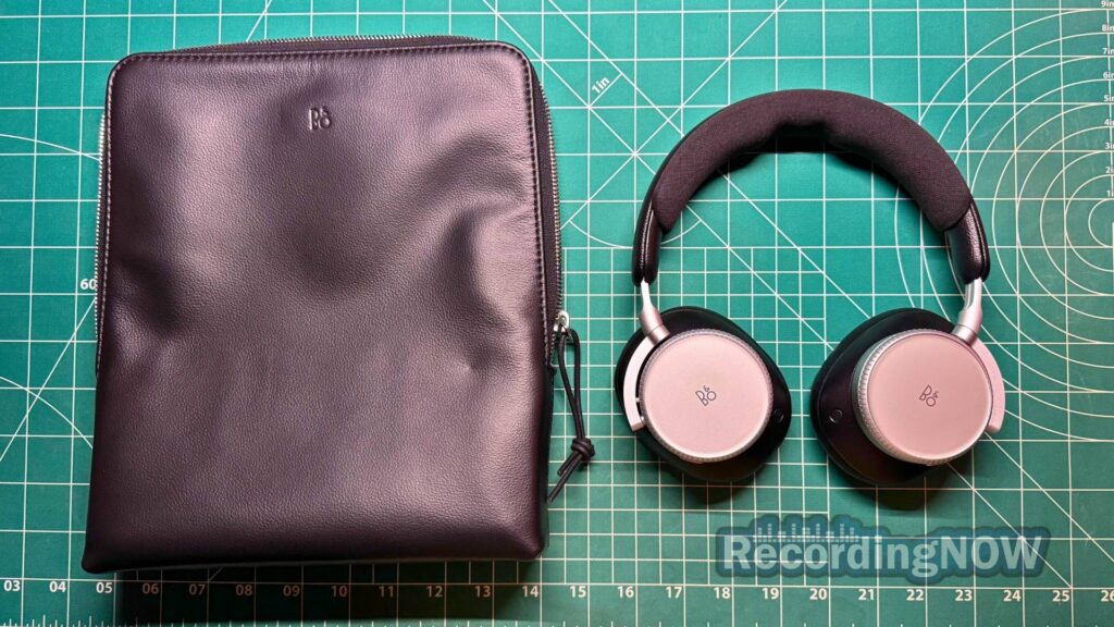 blog-img-1708911919221 Bang & Olufsen Beoplay H100 headphones next to included leather softshell case