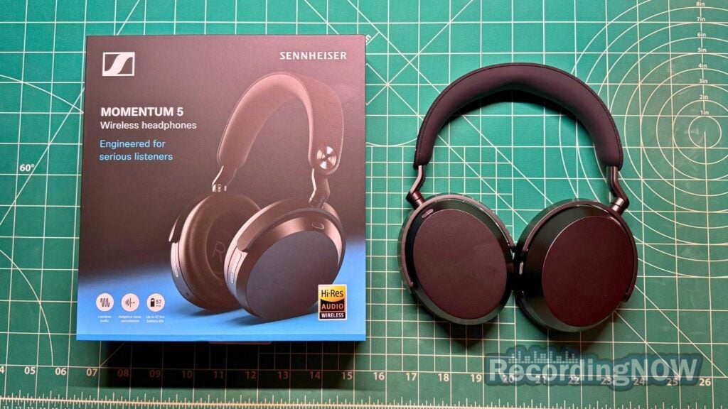 Sennheiser Momentum 5 headphones in black next to original box packaging