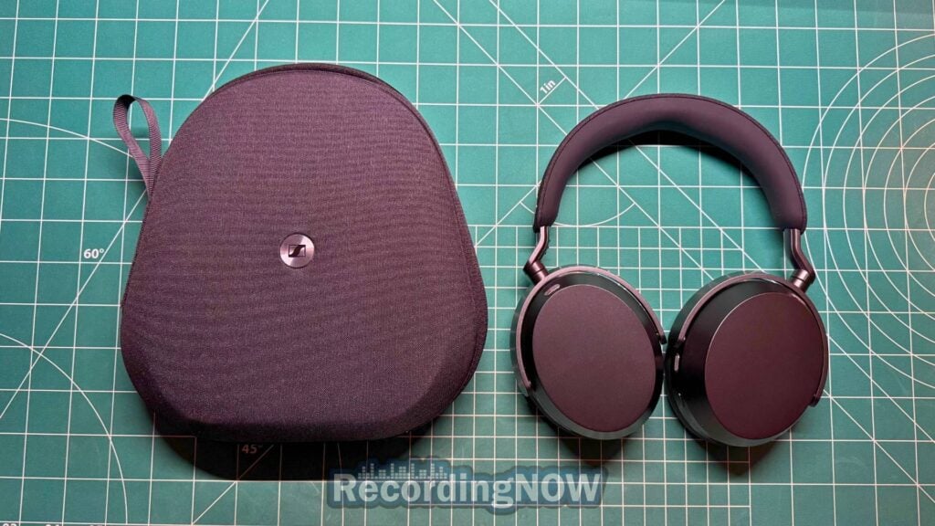Sennheiser Momentum 5 headphones next to included premium hardshell case