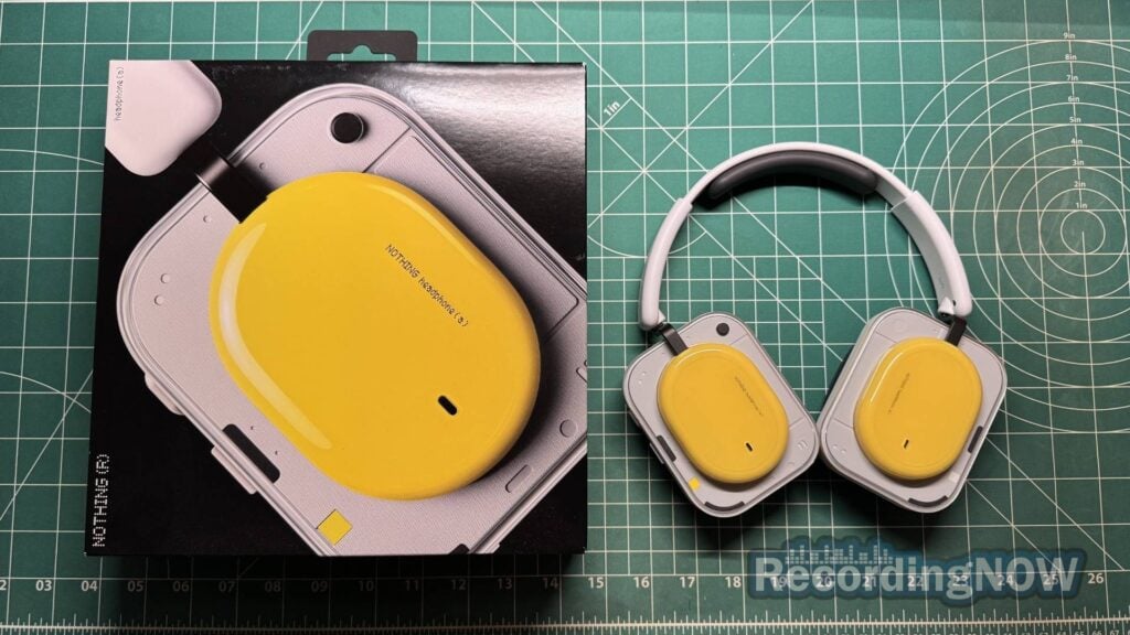 blog-img-1693067280109 Nothing Headphone (a) in yellow next to original box packaging