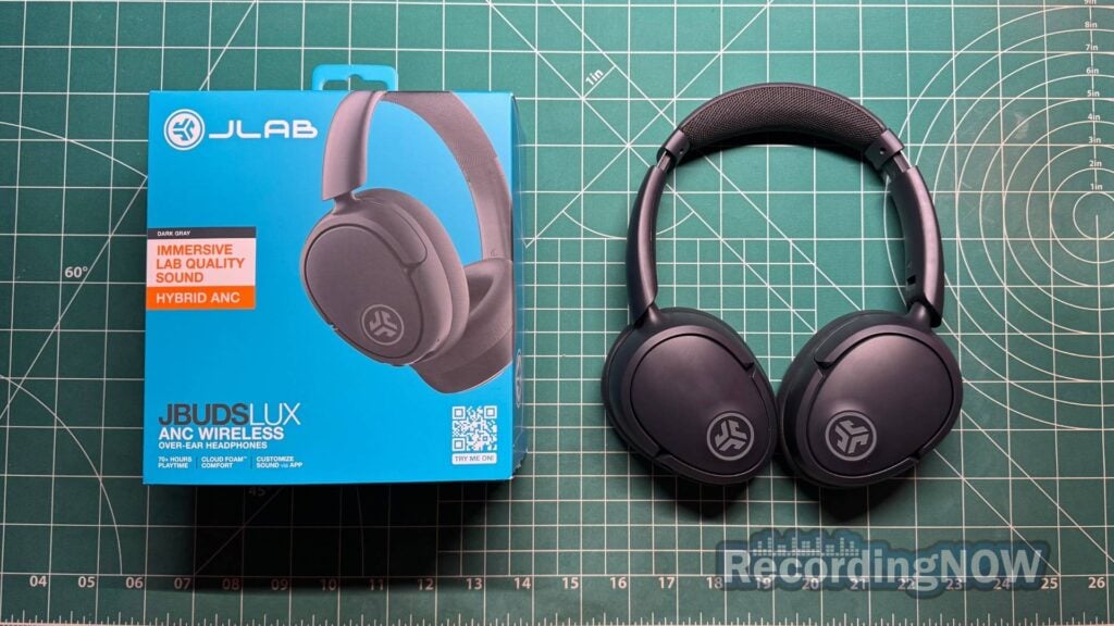 JLab JBuds Lux ANC wireless headphones next to original box packaging