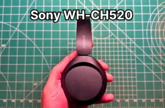 Holding Sony WH-CH520 on-ear wireless headphones in hand