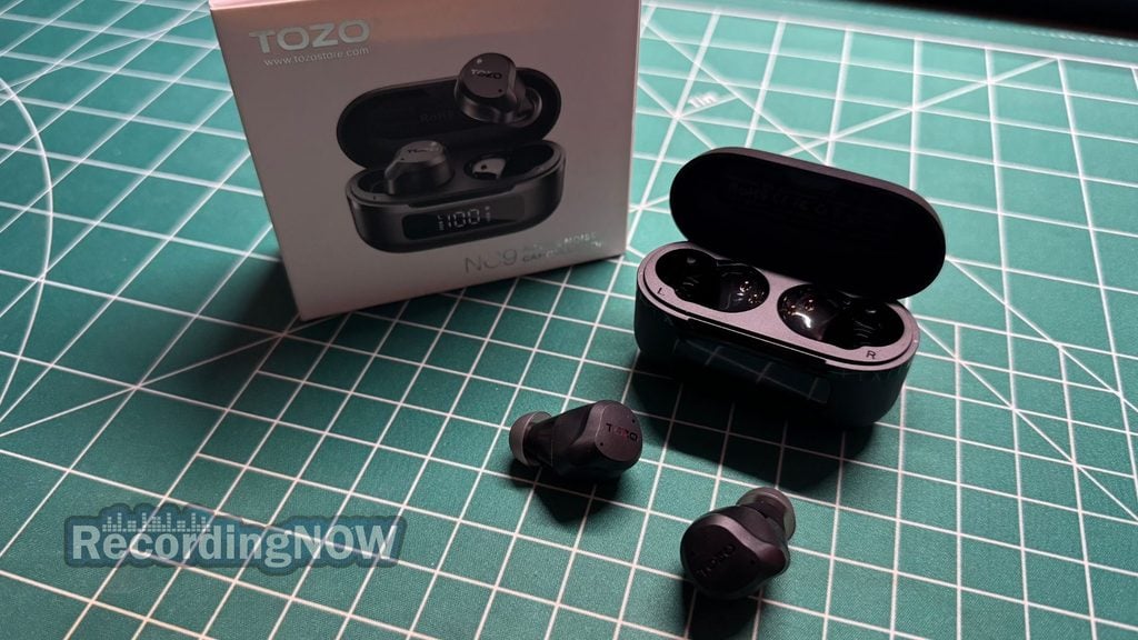 TOZO NC9 earbuds and charging case next to box
