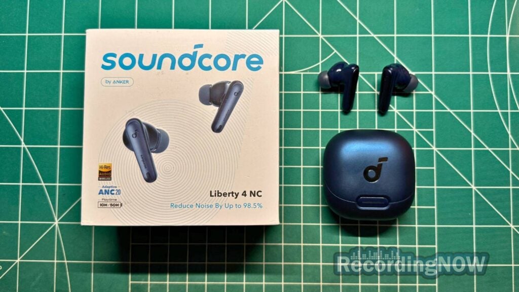 Anker Soundcore Liberty 4 NC in blue next to original box packaging