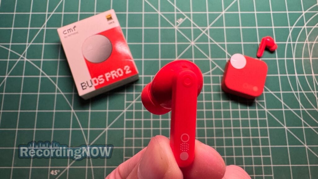 blog-img-1693067280109 Holding CMF Buds Pro 2 wireless noise cancelling earbuds in hand