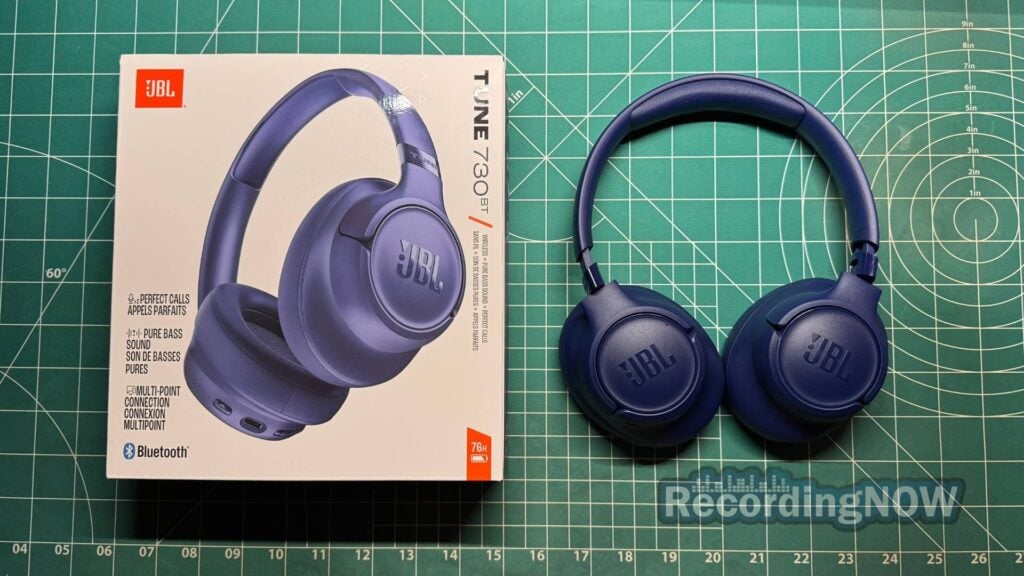 JBL Tune 730BT wireless headphones next to original box packaging