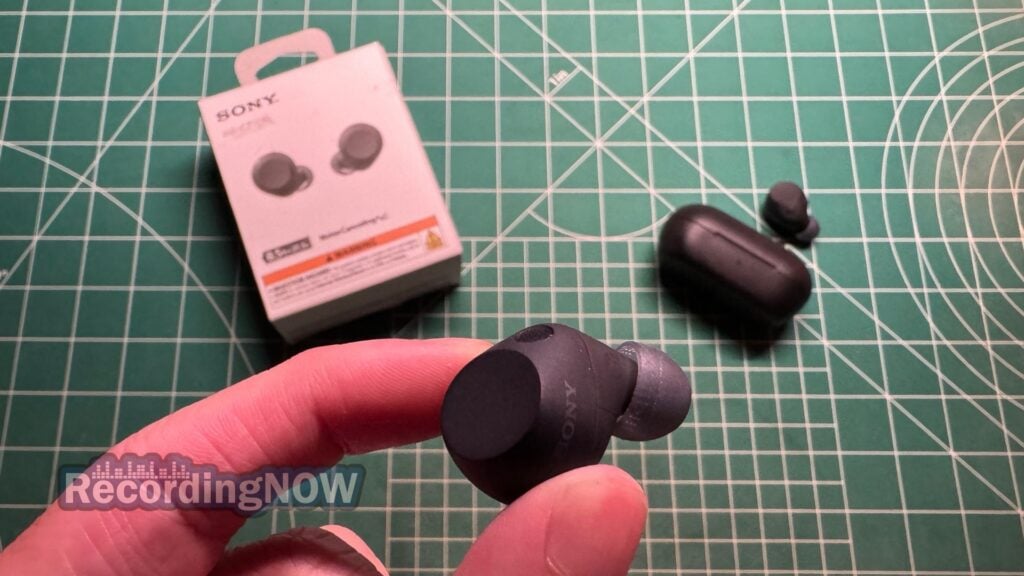 blog-img-1693067280109 Holding Sony WF-C710N wireless noise cancelling earbuds in hand