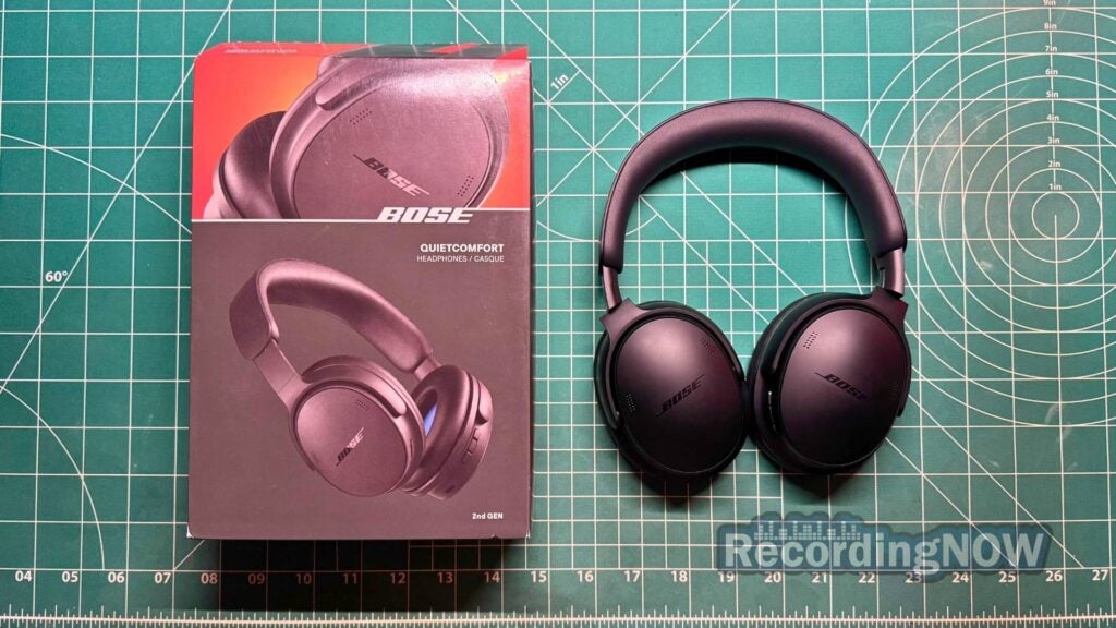 blog-img-1708892563107 Bose QuietComfort 2nd Gen headphones in black next to original box packaging