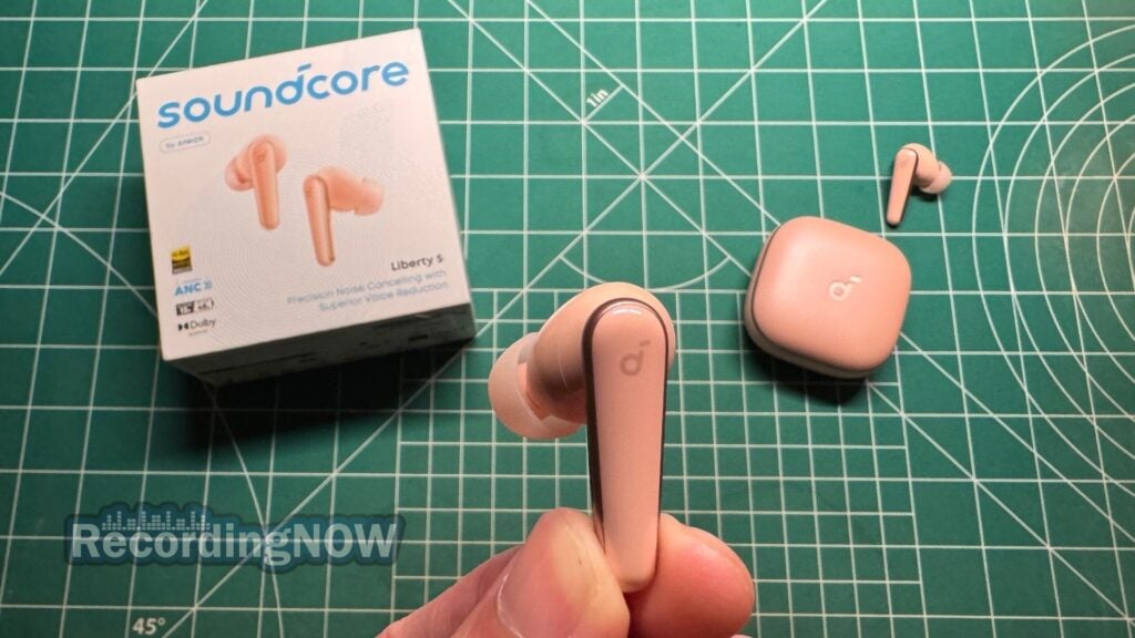 blog-img-1693067280109 Holding Anker Soundcore Liberty 5 wireless noise cancelling earbuds in hand