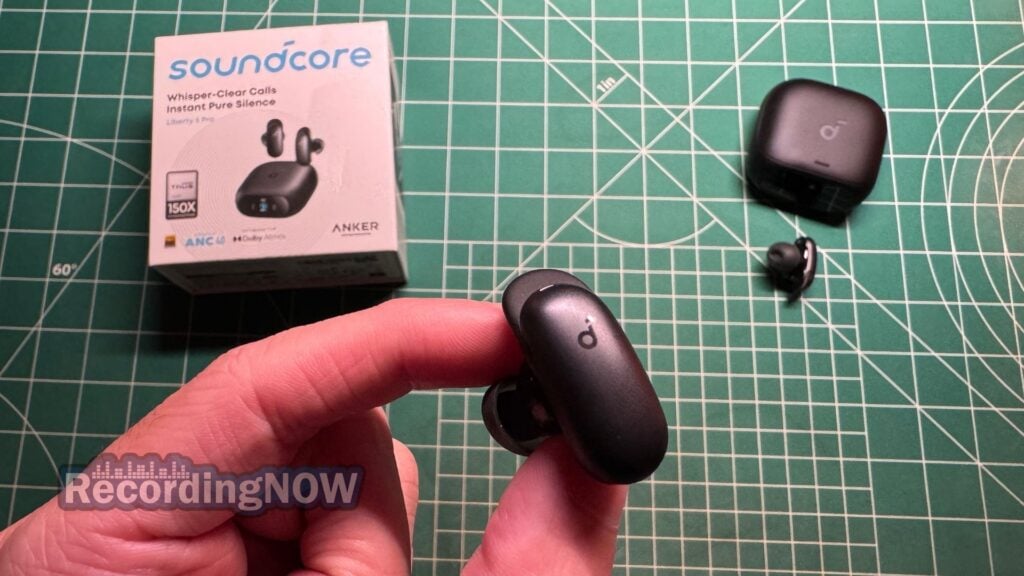 blog-img-1693067280109 Holding Anker Soundcore Liberty 5 Pro wireless noise cancelling earbuds in hand