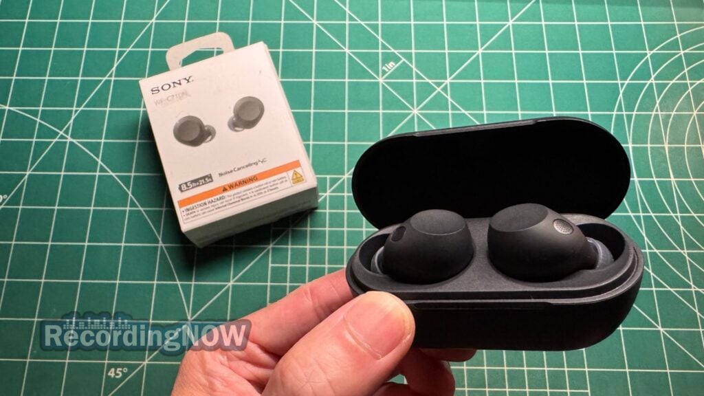 blog-img-1693070240787 Holding Sony WF-C710N earbuds inside charging case