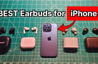Apple iPhone 15 Pro next to AirPods Pro 3 and several wireless noise cancelling earbuds