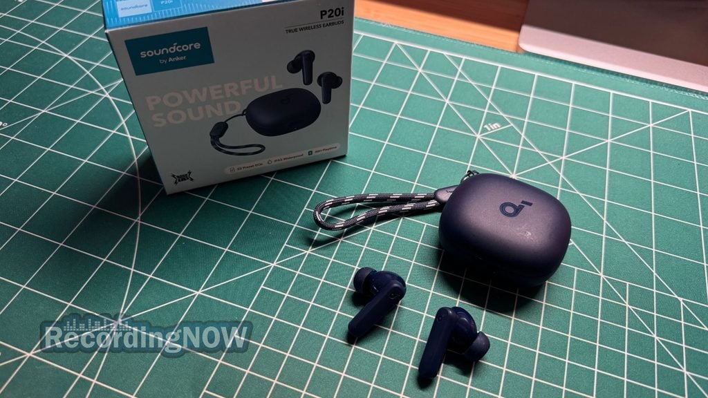 Soundcore P20i earbuds and charging case next to box
