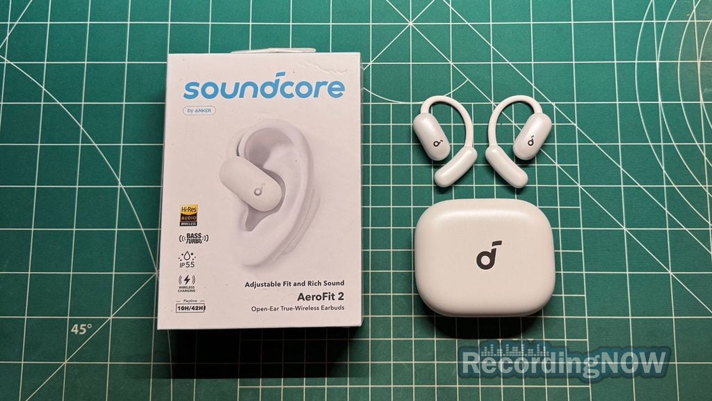 blog-img-1693067280109 Anker Soundcore AeroFit 2 open ear earbuds next to charging case and box