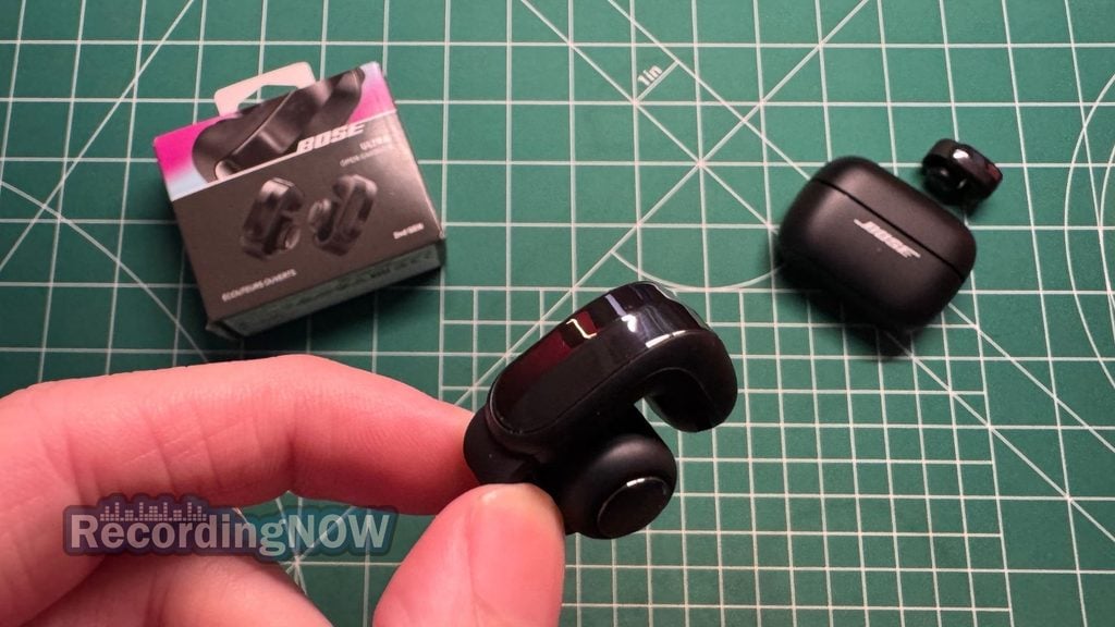 Holding Bose Ultra Open Earbuds 2nd gen wireless clip on earbud in hand